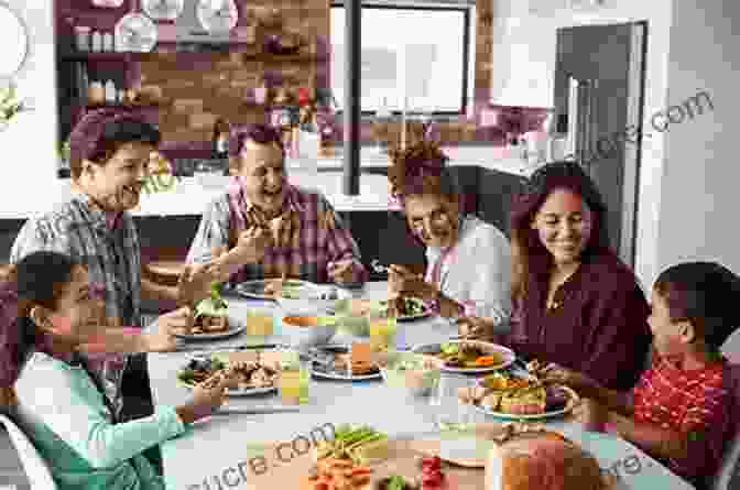 A Family Sitting Down To A Healthy Meal Together. Holistic Health Clean Eating Cookbook: The Ultimate Guide To Clean Eating Quick And Easy The Whole Family Will Love