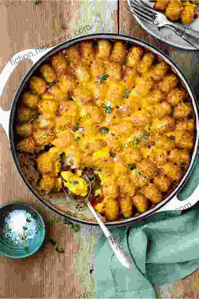 A Plate Of Fluffy Scrambled Eggs With Crispy Tater Tots And Melted Cheese TOTS EVERYTHING Recipe Cookbook: BEST Creative Simple And Easy To Make Tater Tot Recipes At Home